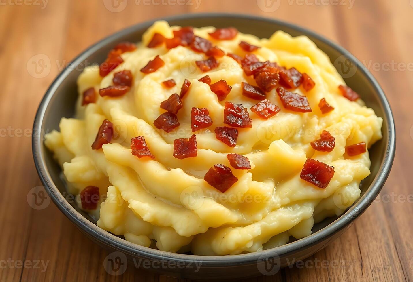 bowl of mashed potatoes topped with bacon photo