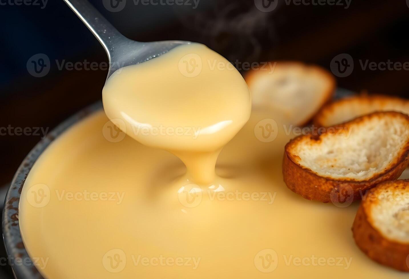 Cheese fondue with bread photo