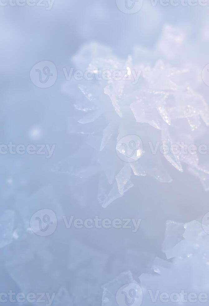 A close up of a snowflake on a surface photo