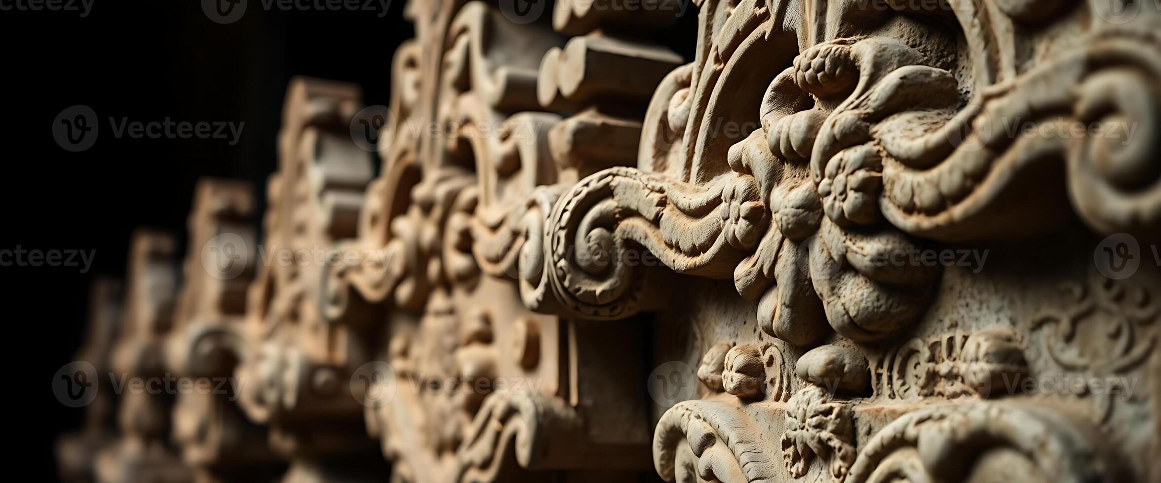 Close up of carved wood on a wall photo