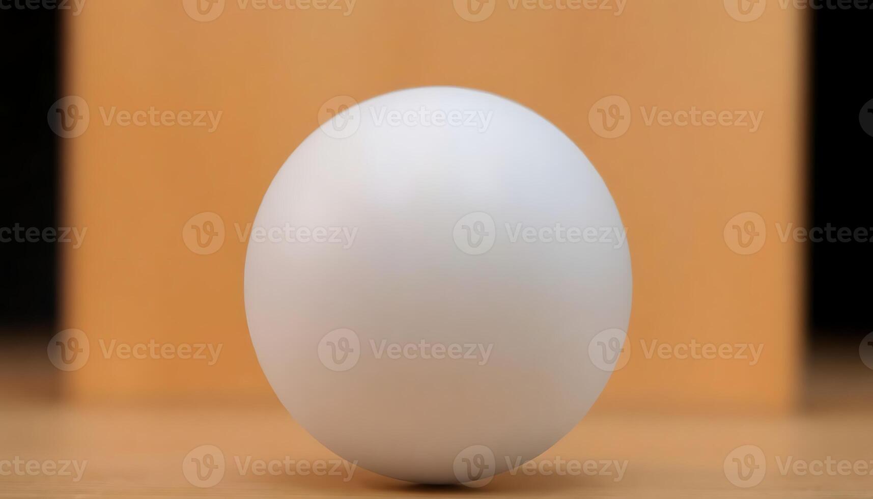 white egg sitting on top of a wooden table photo