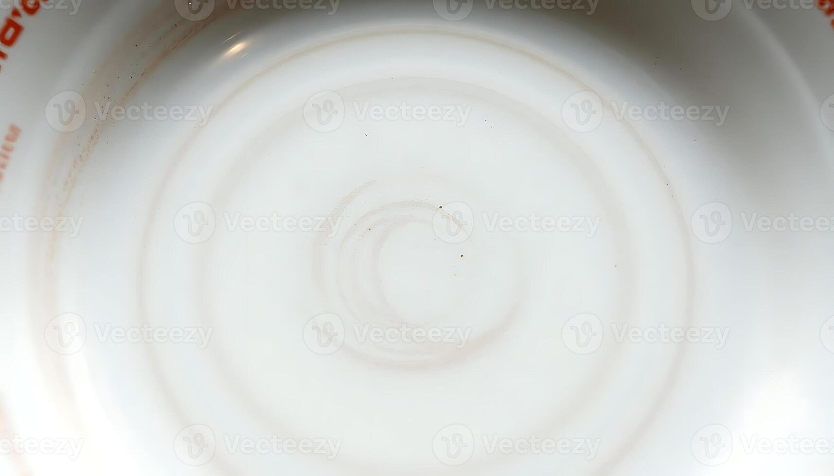 close up of a white bowl with a spiral design photo