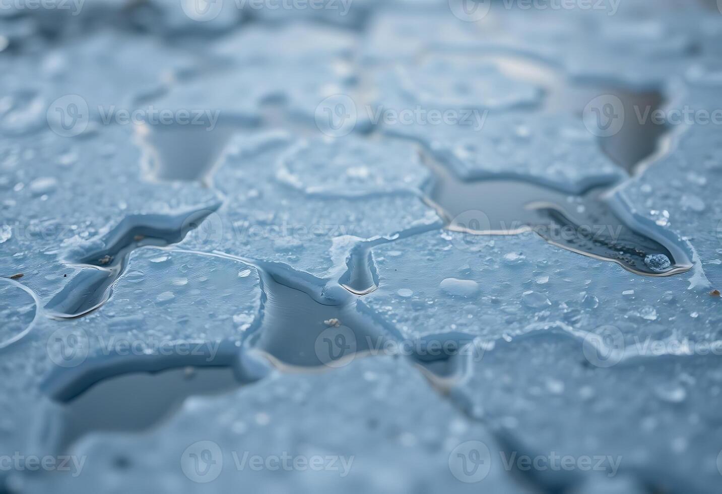 A close up of water droplets on a surface photo