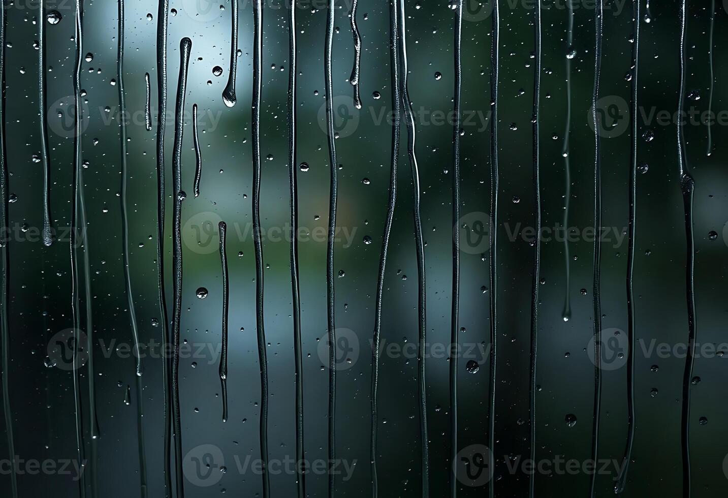 Raindrops on a window, with a blurred background photo