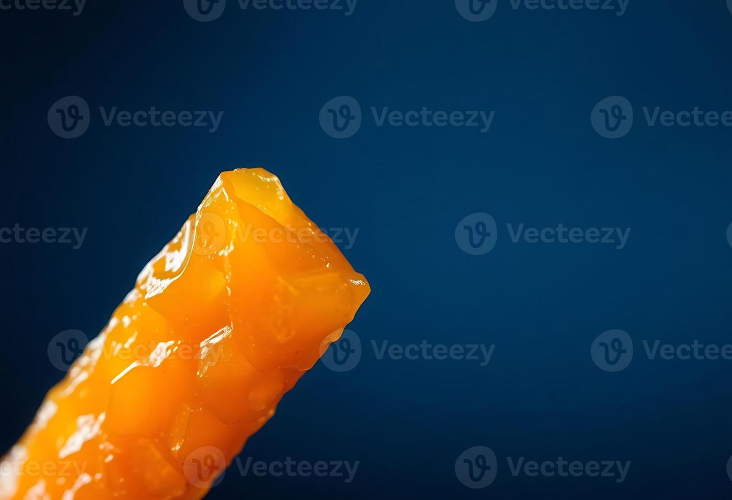 close up of a piece of fruit on a stick photo