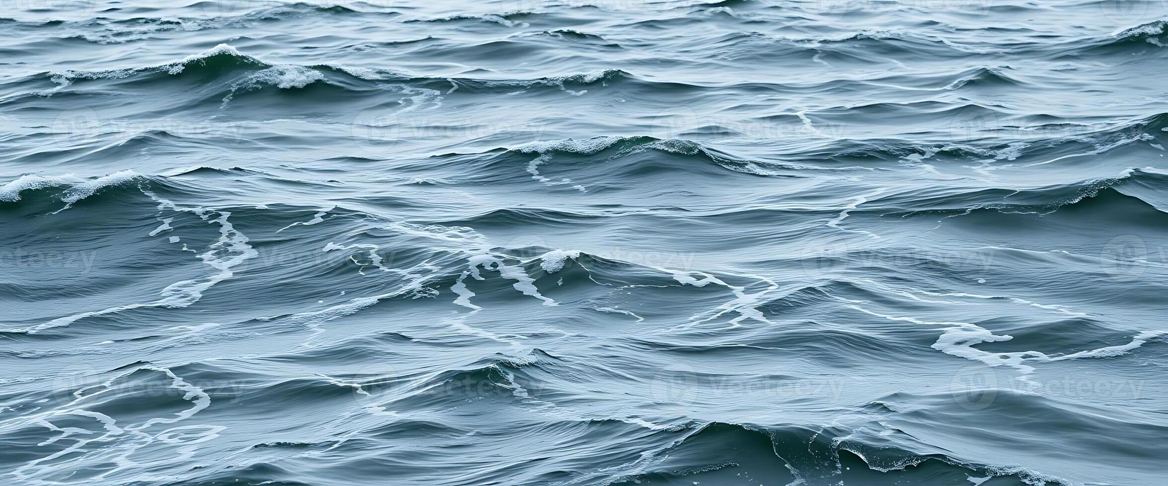 A view of the ocean from above with waves photo