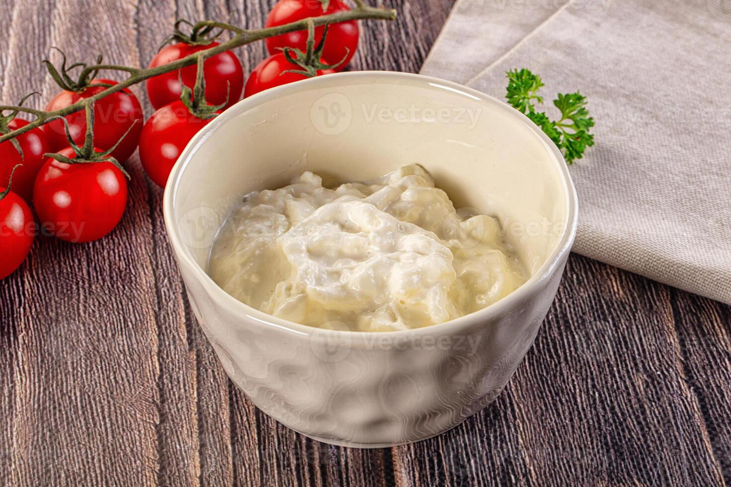 A white cup with yogurt photo
