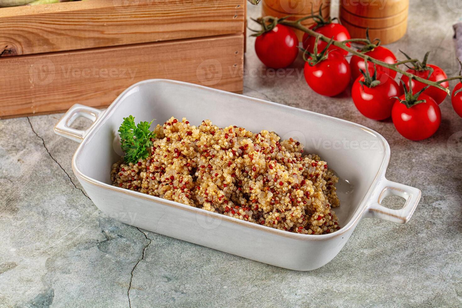 A white dish with a bowl of food on a table photo