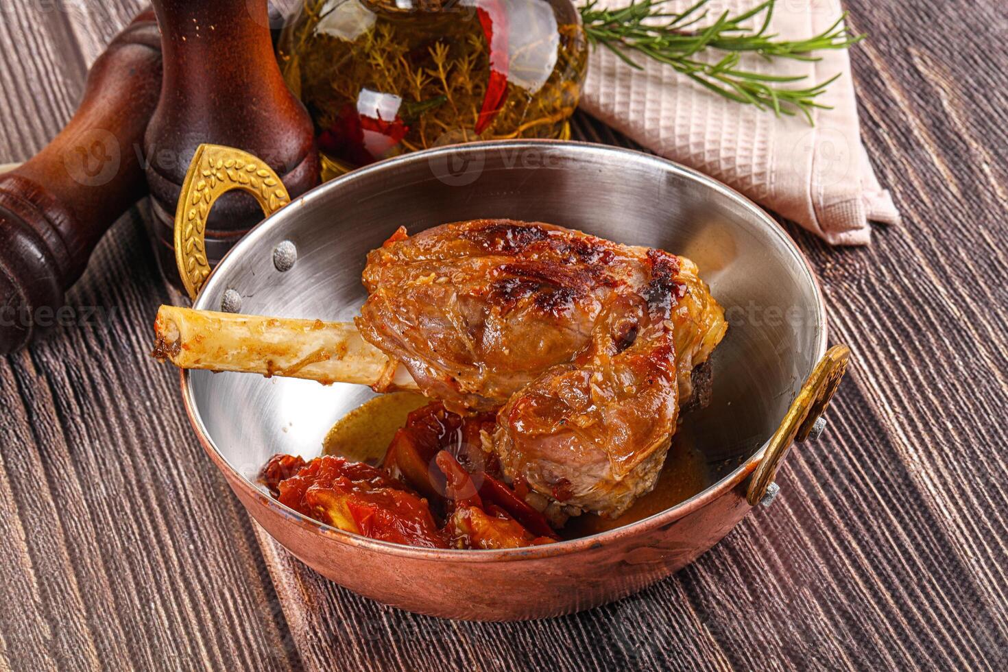 A pan with a meat dish in it photo
