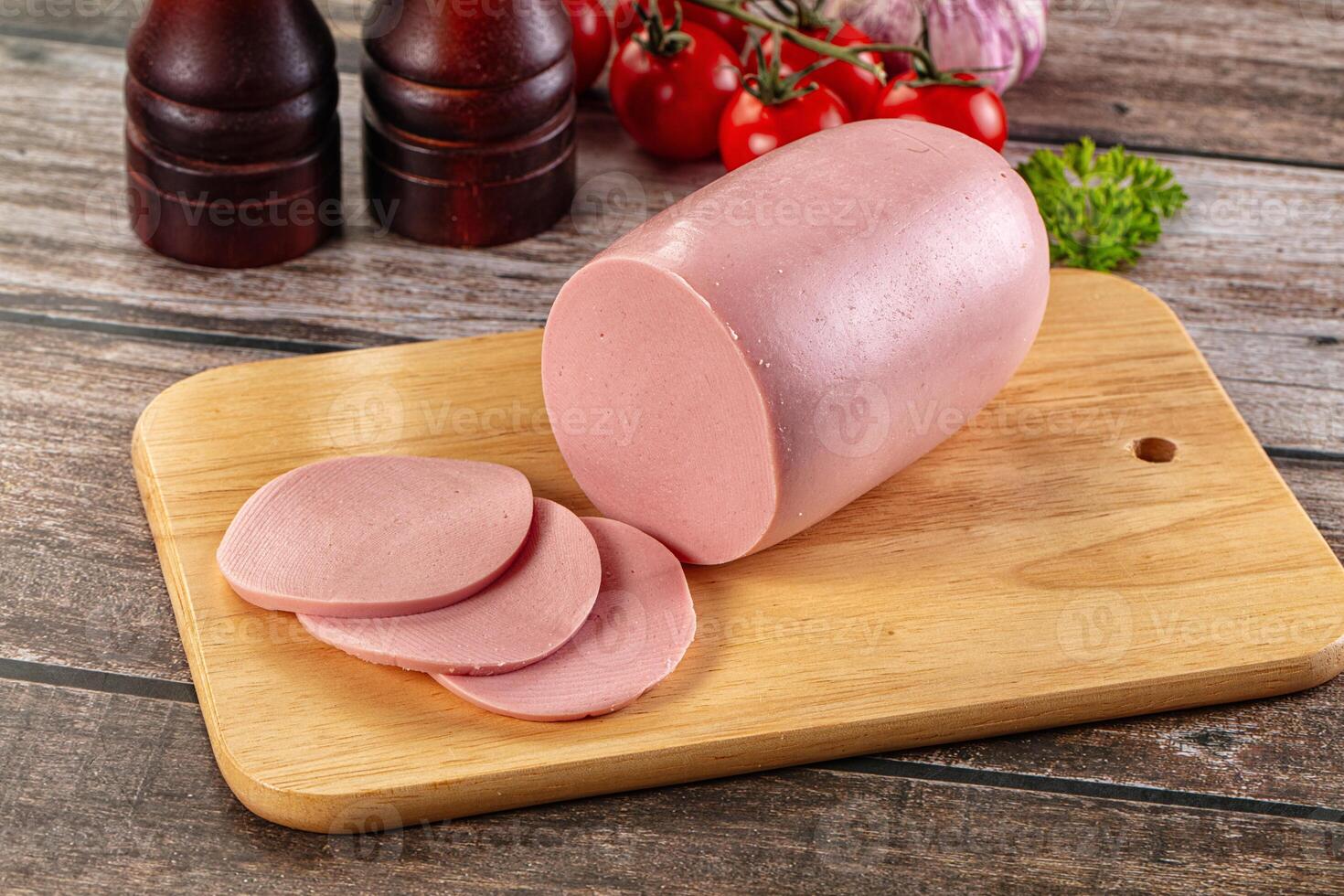 Boiled sausage with slices for breakfast photo
