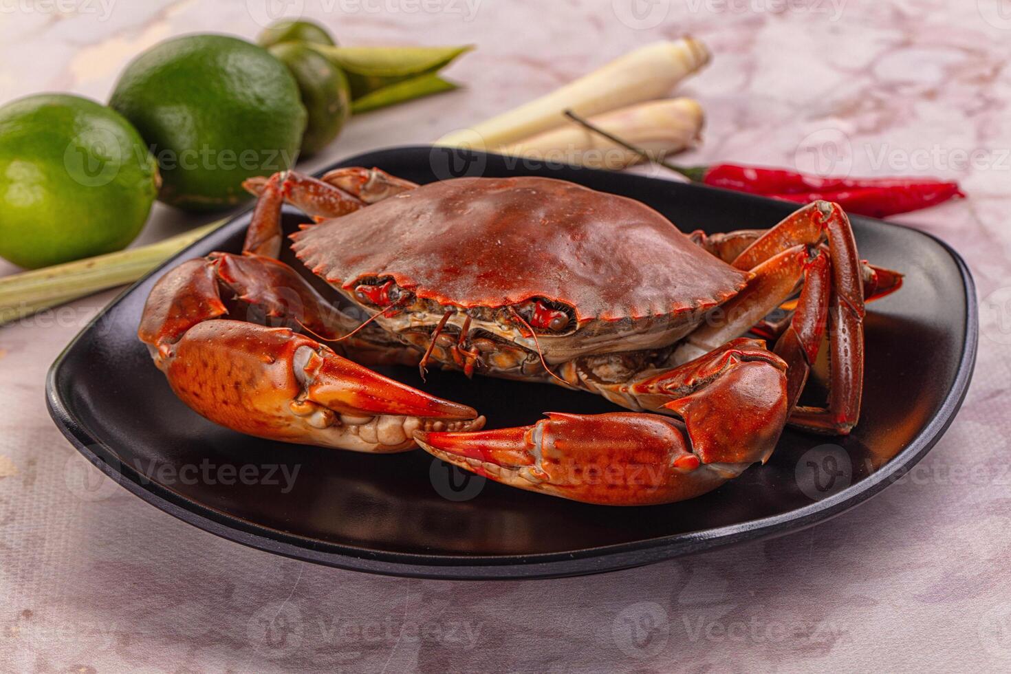 Gourmet steamed crab served lime photo