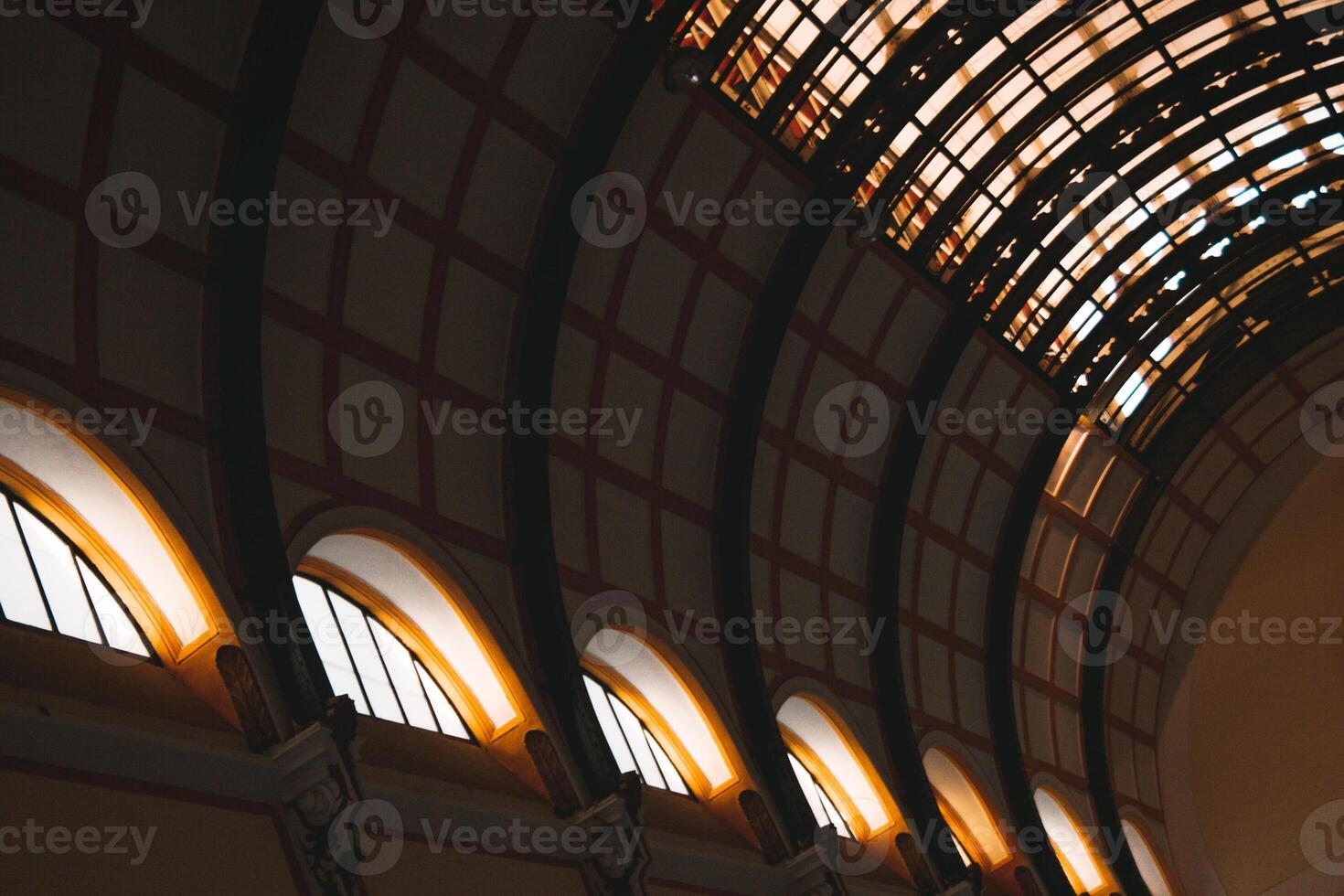 Architectural Grandeur Vaulted Ceiling with Windows in a Classic Building Interior. photo