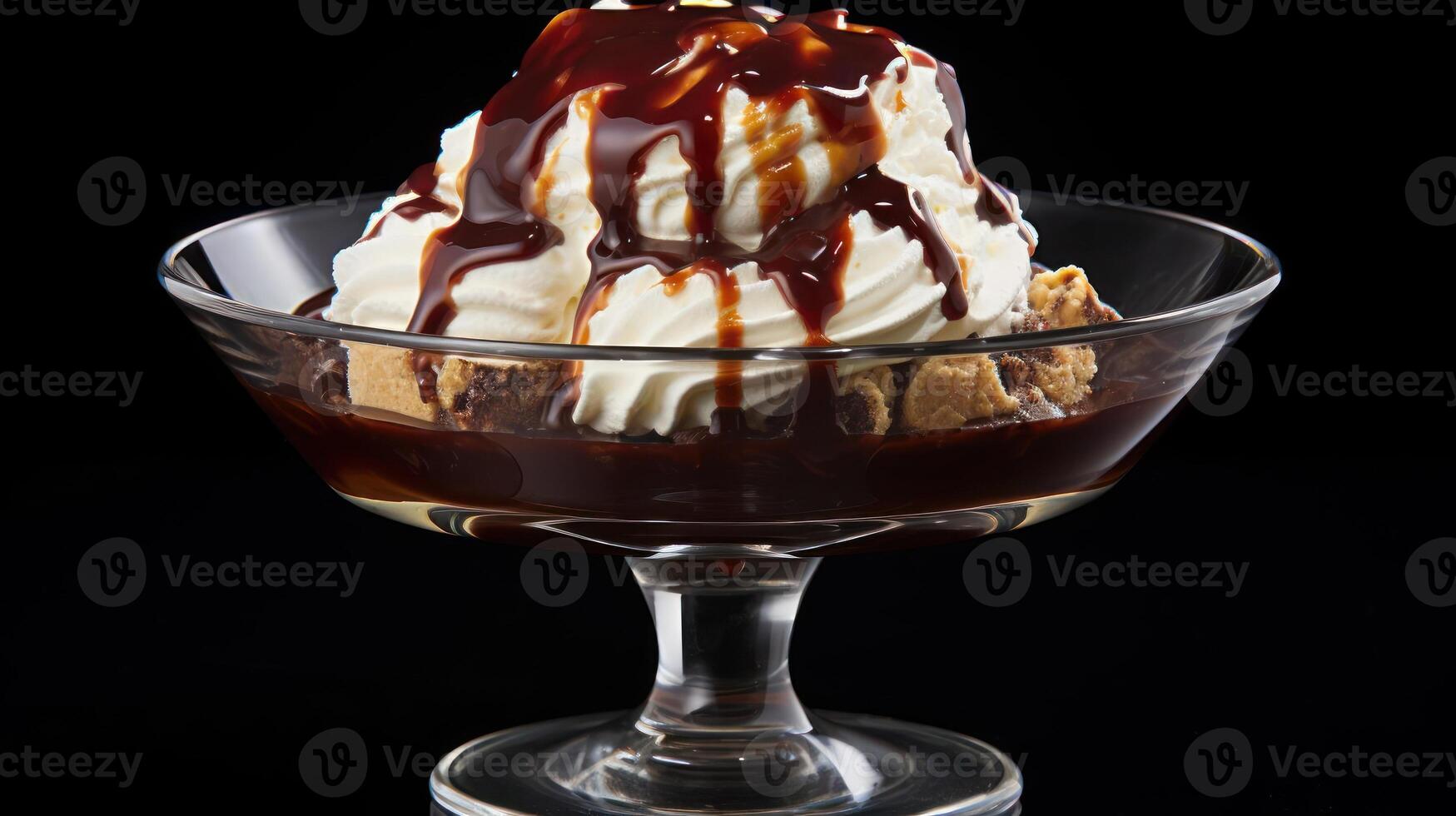 Layered dessert parfait with cream and chocolate sauce. photo