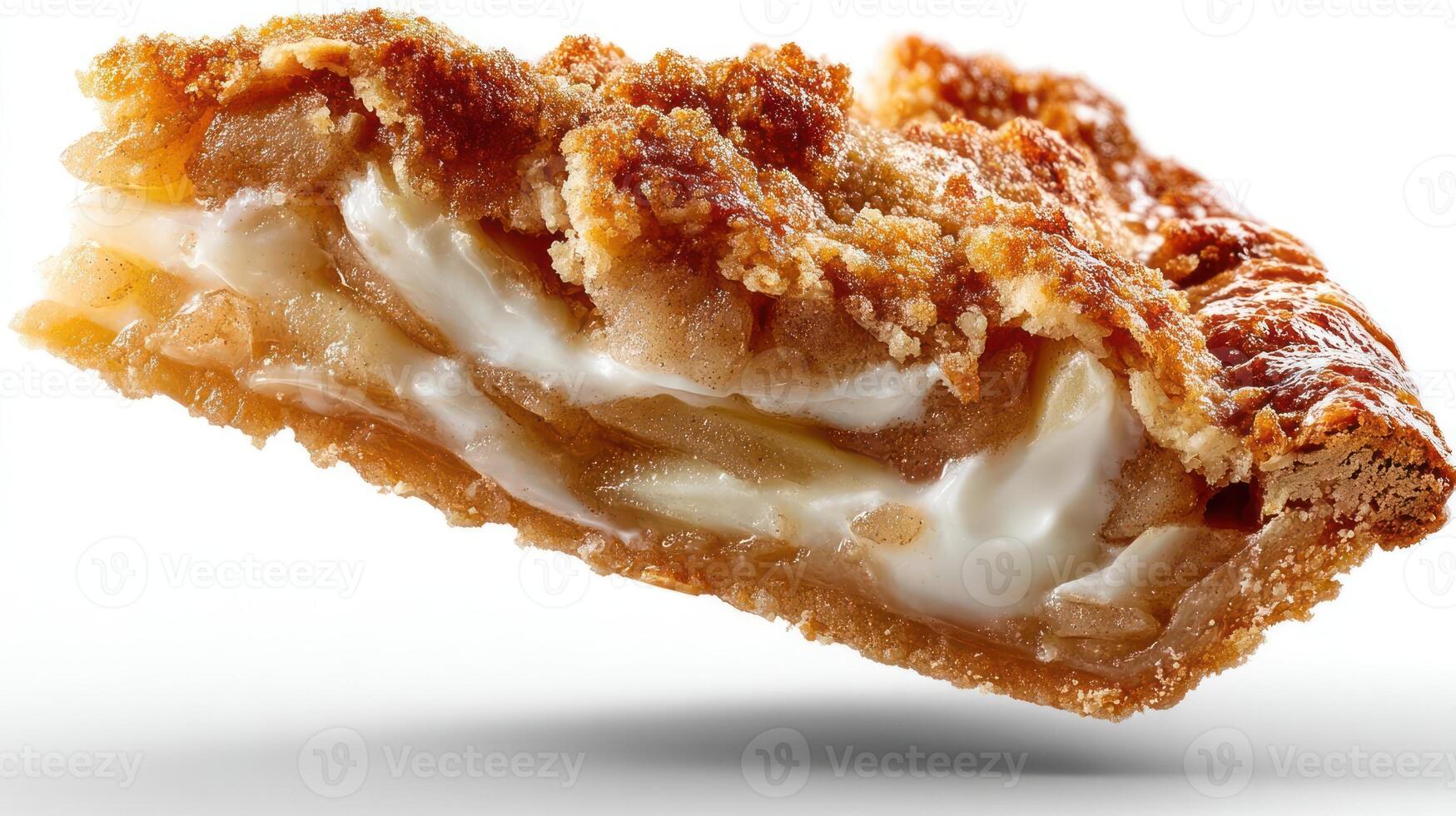 Apple turnover cross-section, showcasing flaky pastry and filling. photo