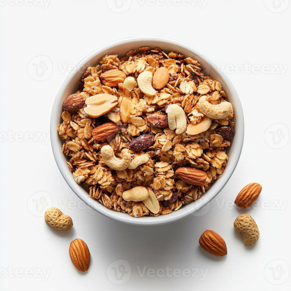 Granola with nuts and almonds in a bowl on a white background photo
