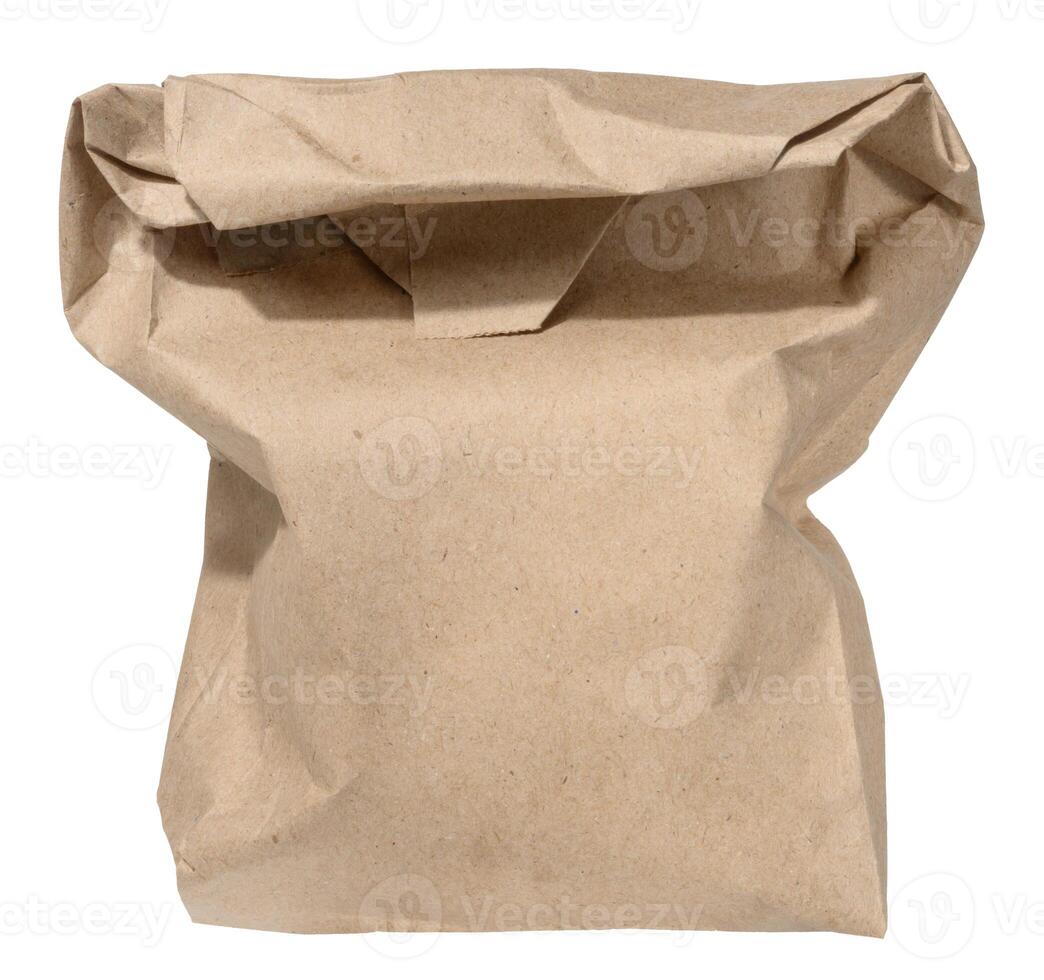 Kraft paper bag for packaging products in stores on an isolated background photo