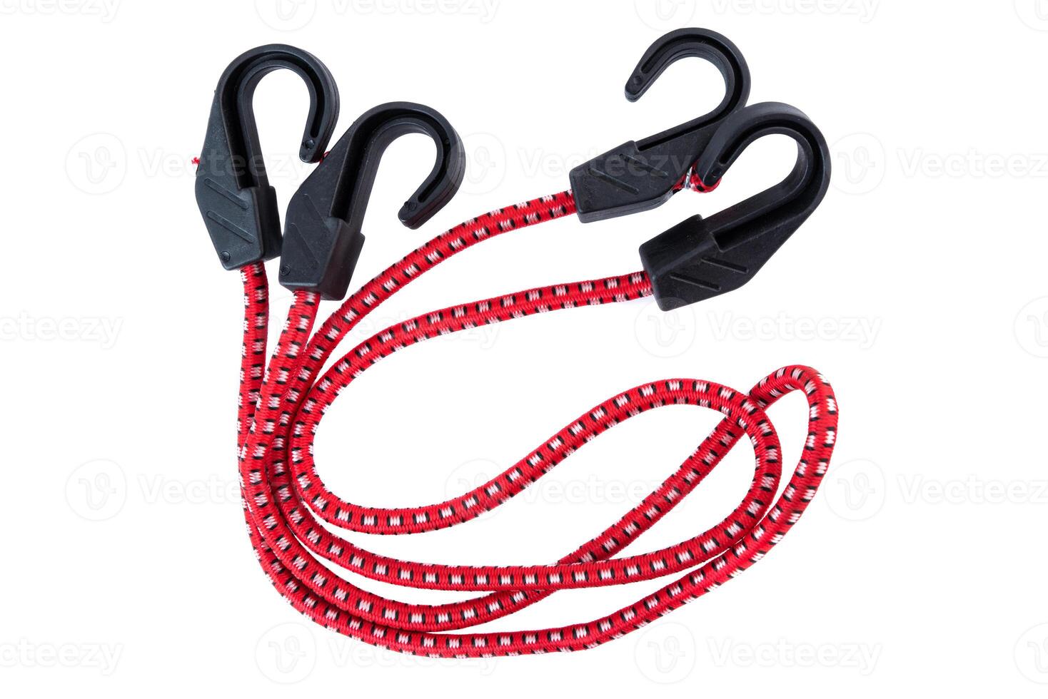 Red bungee cord with four black plastic hooks on a white background. Durable elastic strap for securing items in transport, storage, or outdoor use. photo