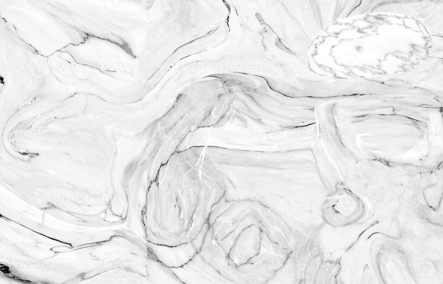 White marble texture with abstract swirling patterns photo