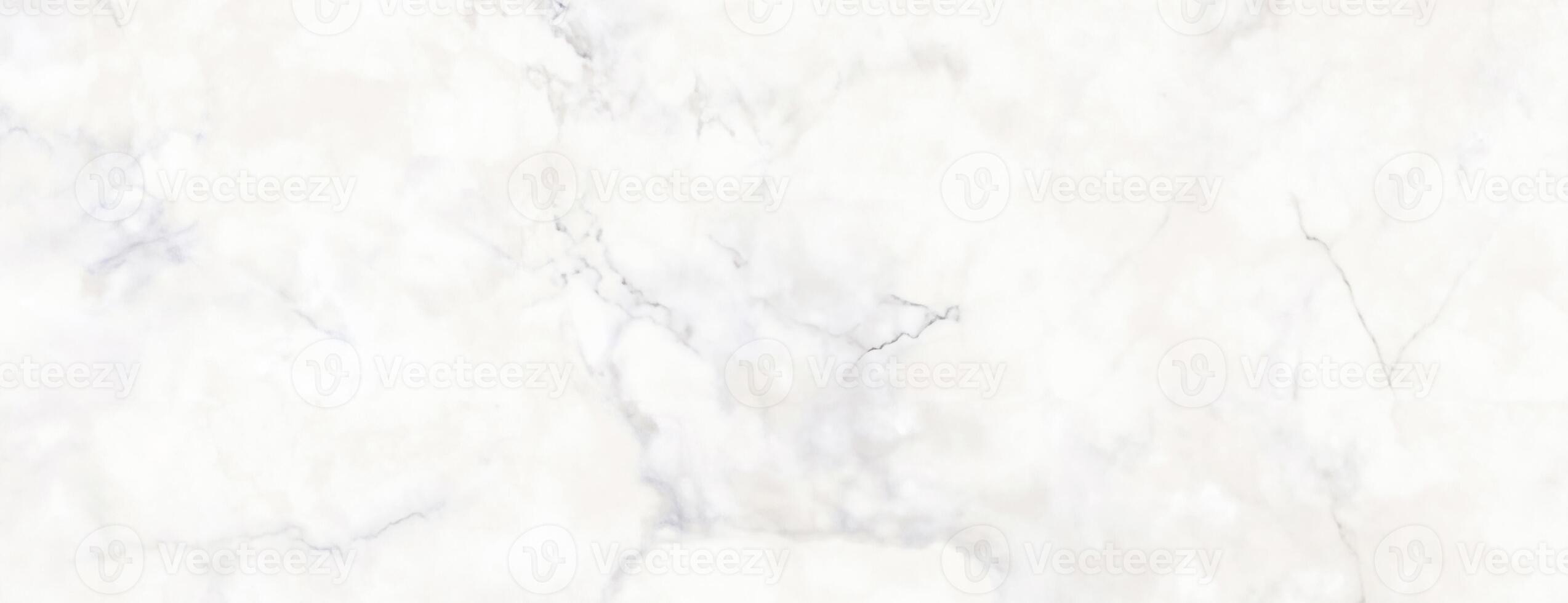 White marble texture with soft cloudy veining pattern photo