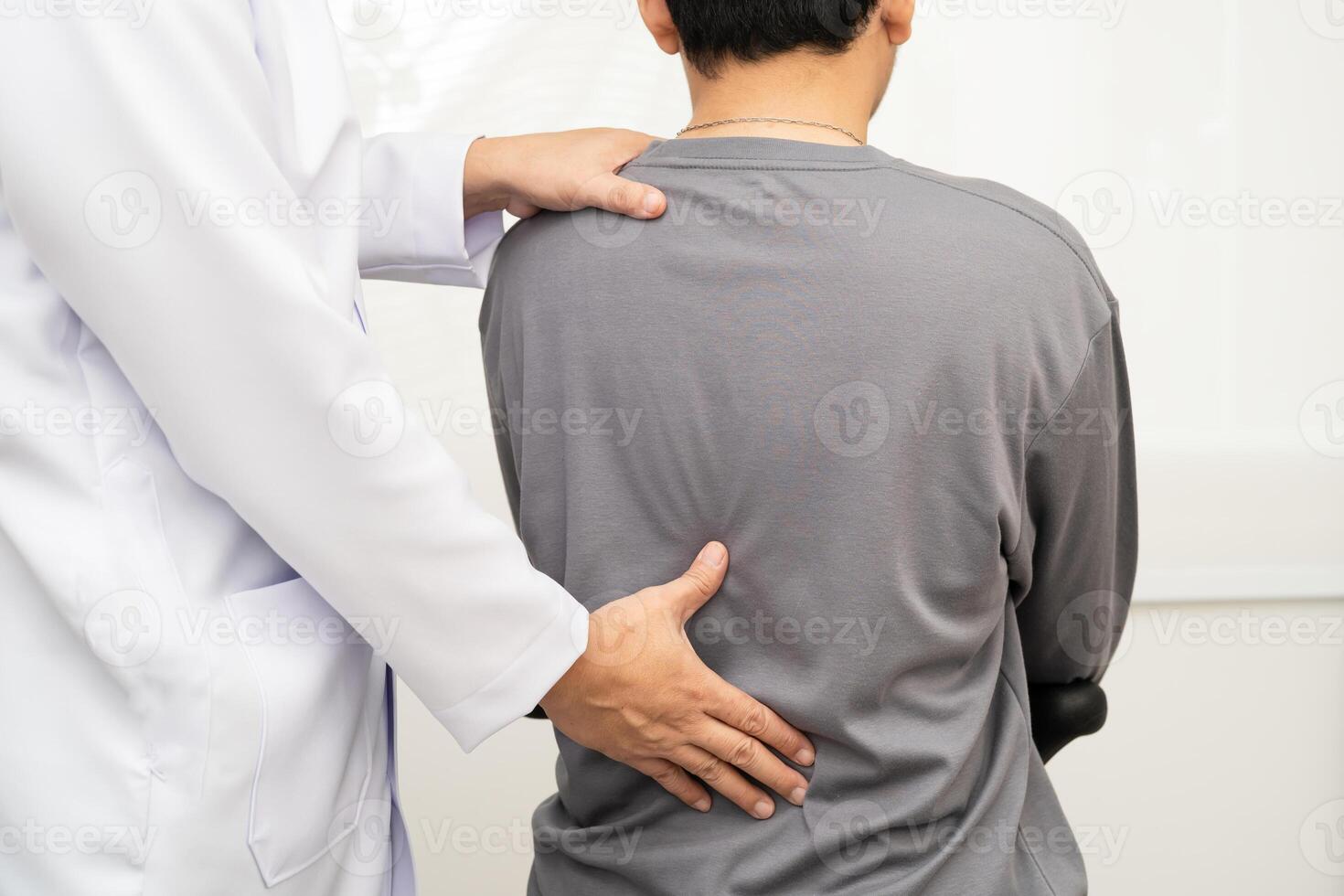 Physical therapy therapist doctor treat perform pain man photo