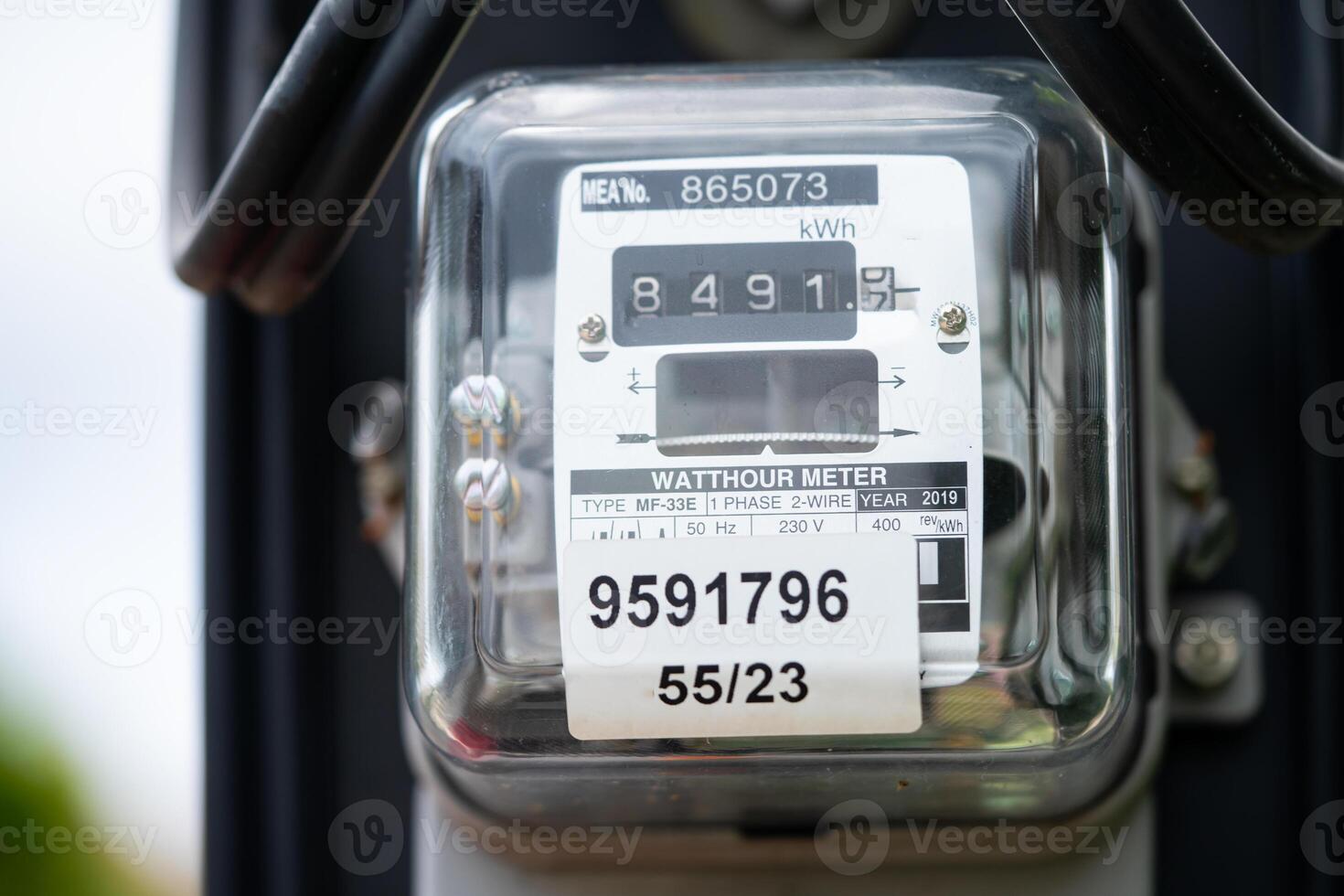 Electric measuring power meter for energy cost at home and office. photo