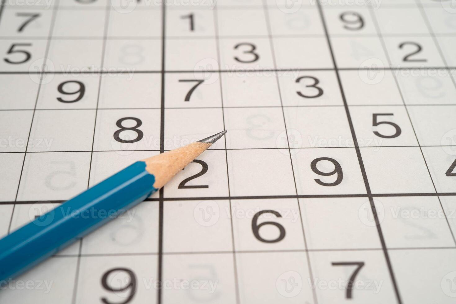 Puzzle game paper pencil photo