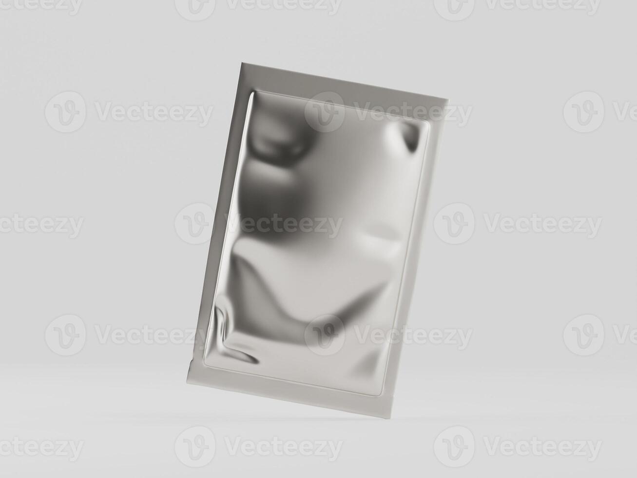 A silver foil packet sitting on a table photo