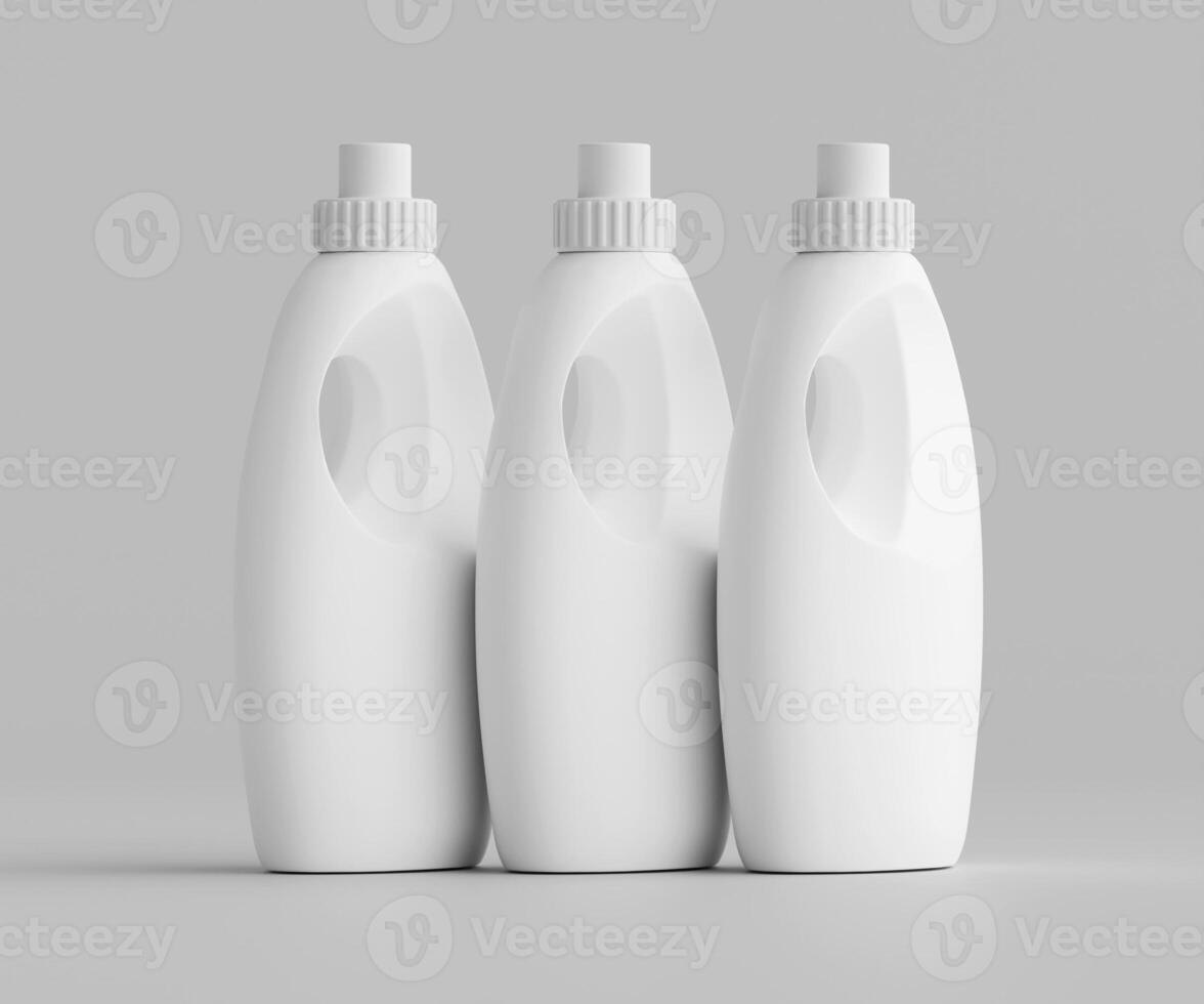 Three white plastic bottles on a gray background photo