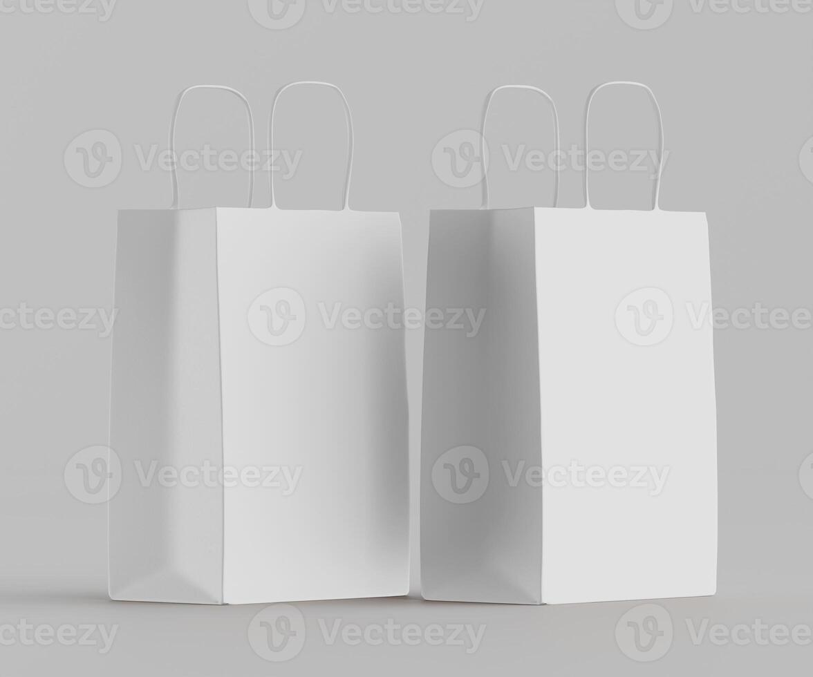 Two white paper bags on a gray background photo