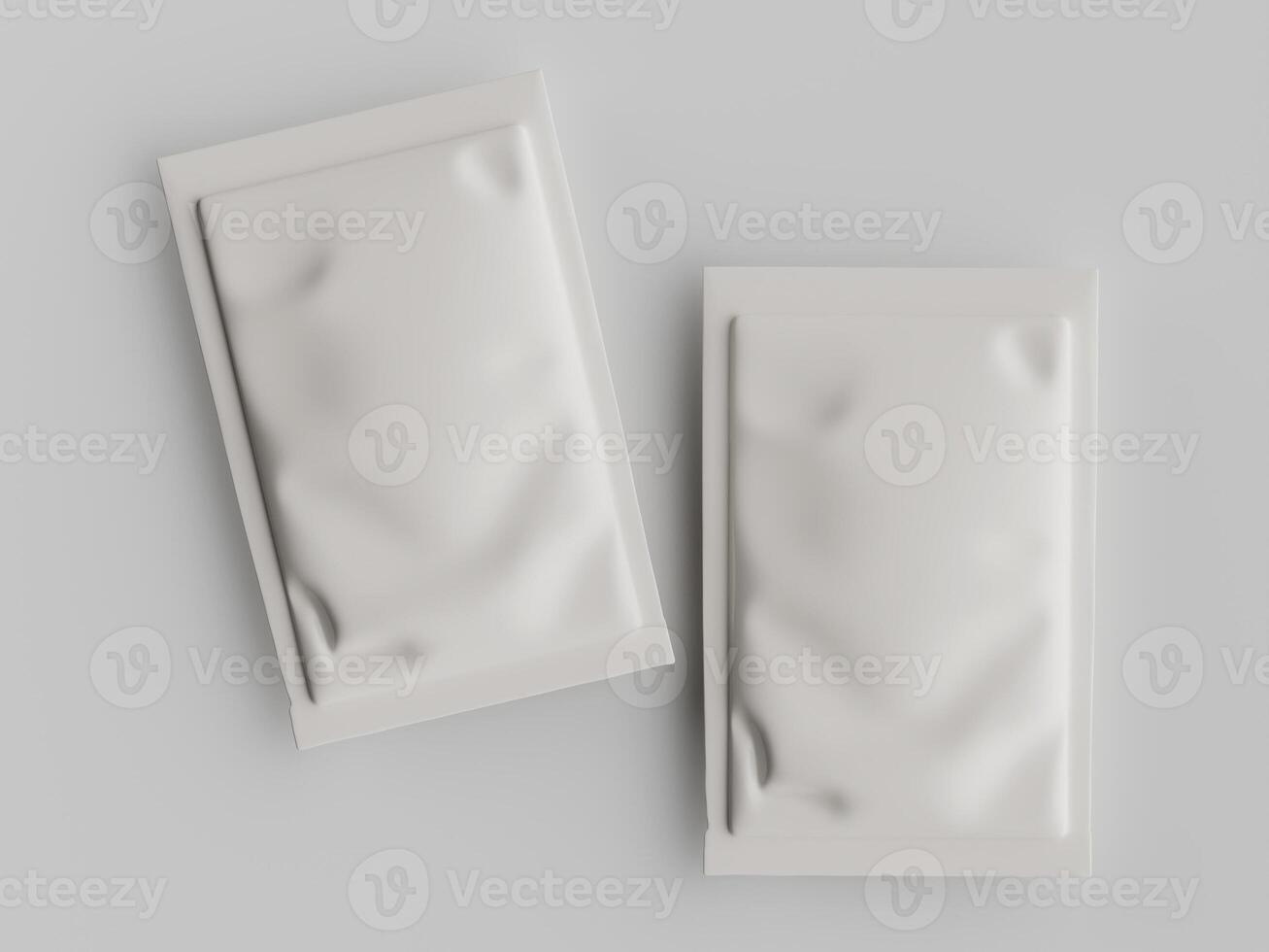 Two white plastic packages on a gray surface photo