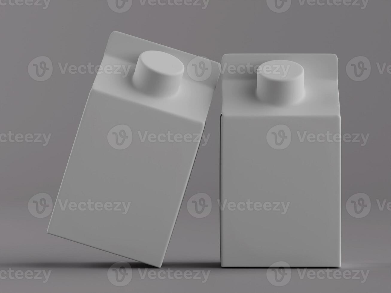 Two empty milk cartons on a gray background photo