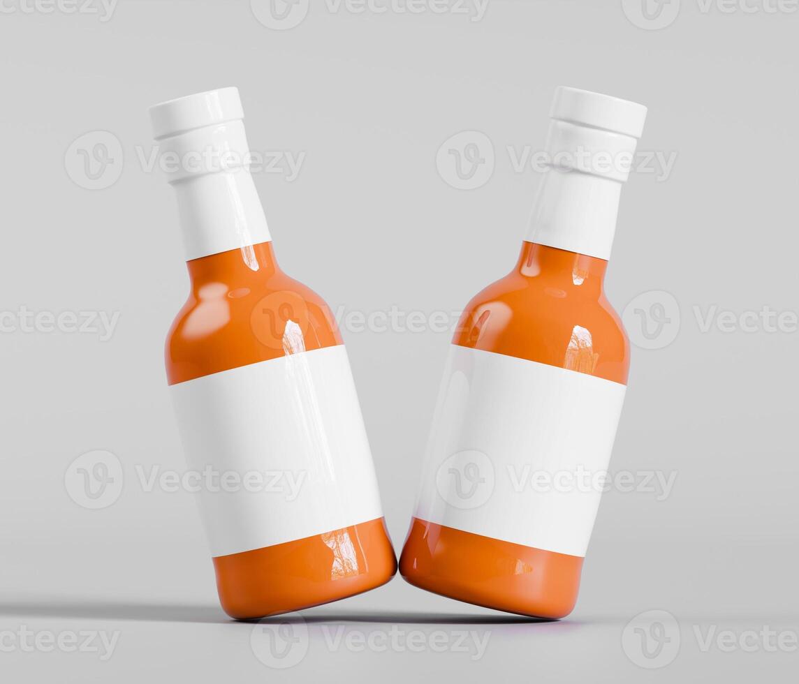 Two orange bottles balanced upright gray background photo