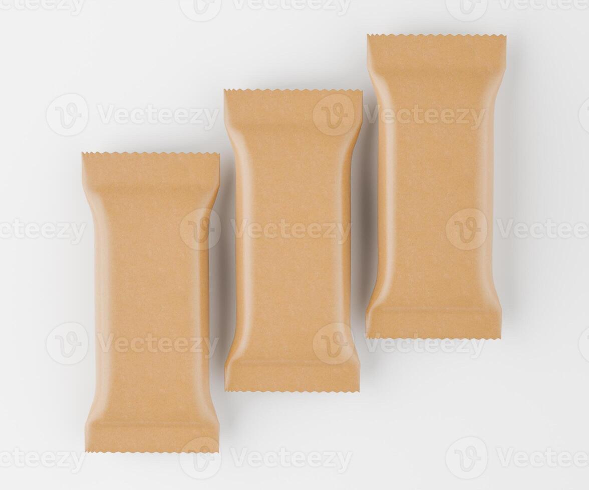 Three brown paper wrapped candy bars on a white surface photo