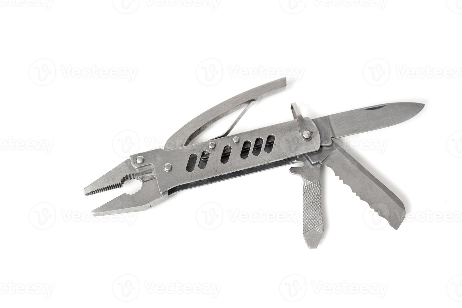 Stainless steel multipurpose tool showing pliers, knife and saw, isolated on white background photo