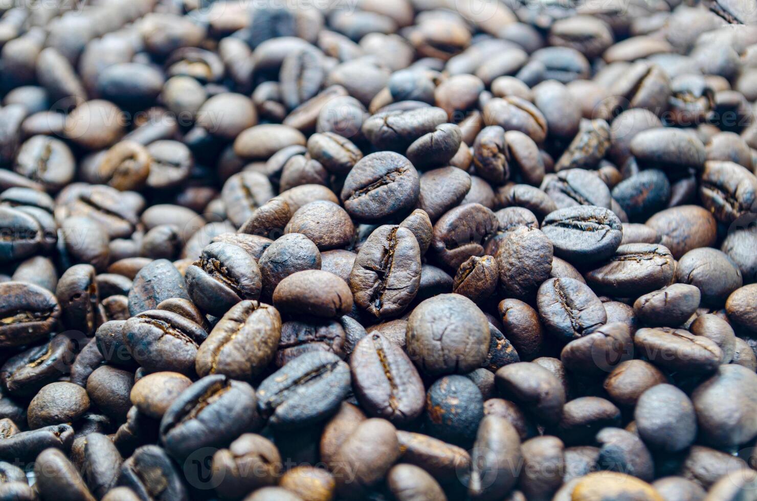 Roasted coffee beans that highlights the texture and surface details of the coffee beans with customizable space for text photo