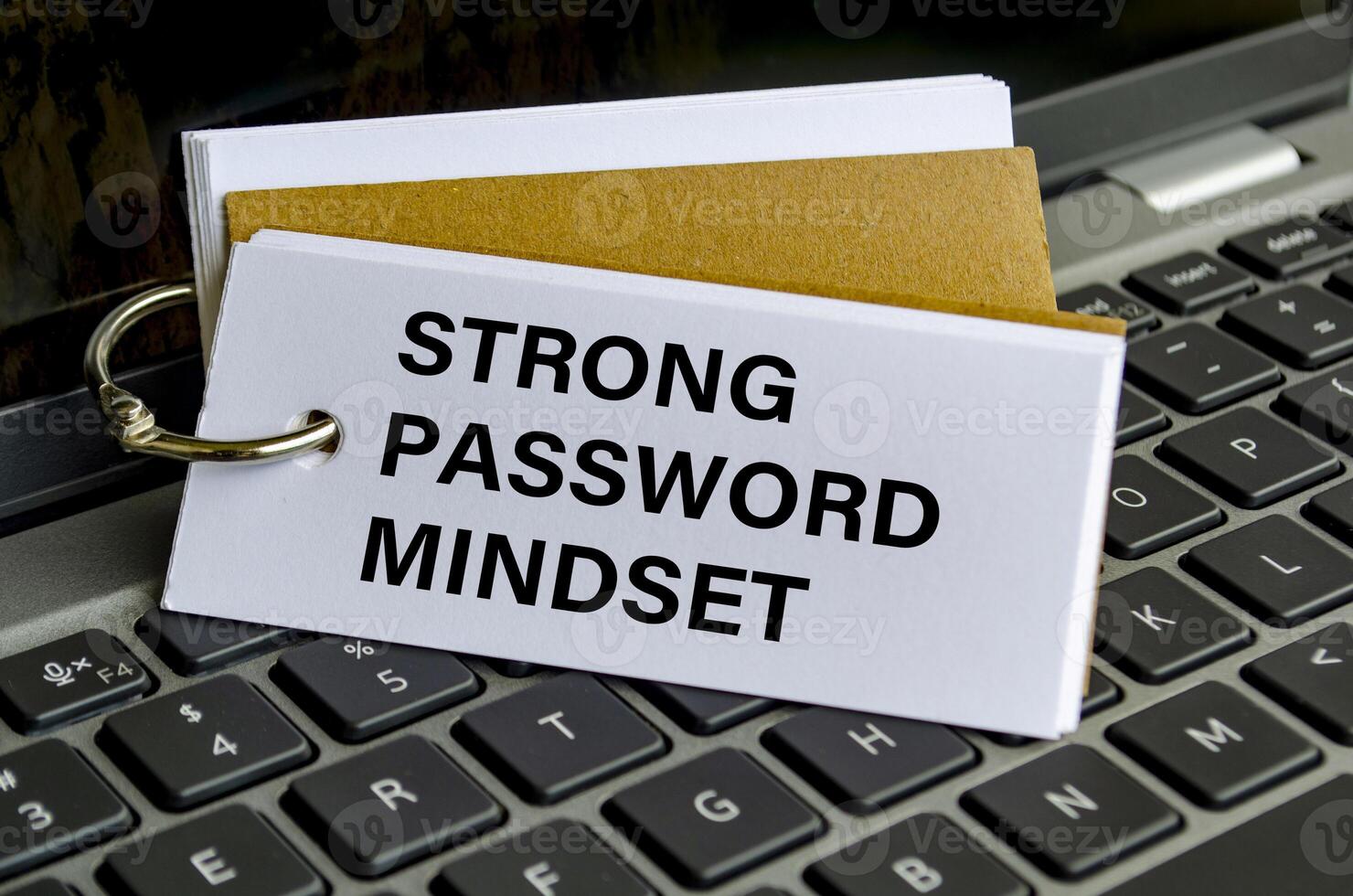 Strong password mindset note on keyboard advocating secure access practices photo