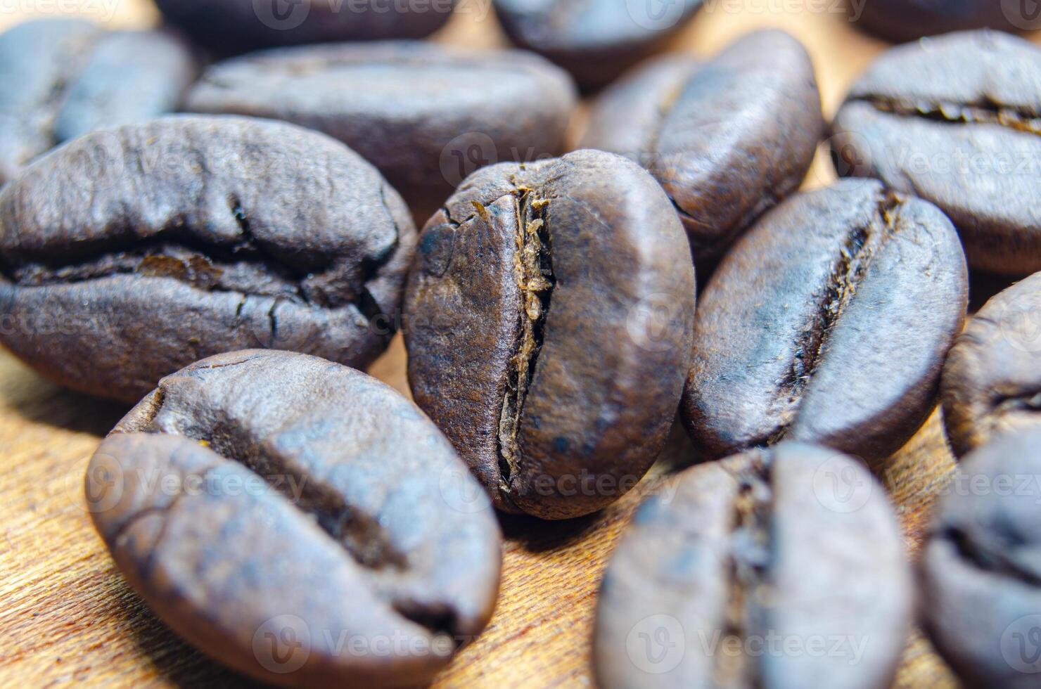 Side view of roasted coffee beans with customizable space for text photo