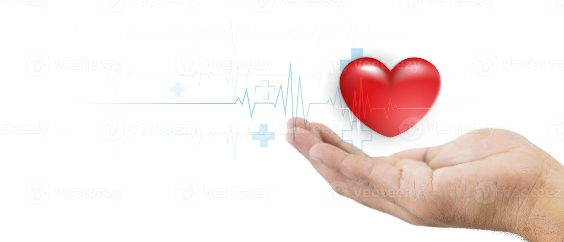 A hand gently holding red heart, symbolizing care and love, with a medical heartbeat line in the background and symbolizing health and love. Showing the connection between love and healthcare. photo