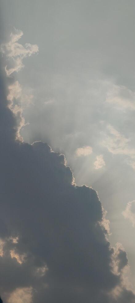 Sun Rays Through Dramatic Clouds Atmospheric Sky Background in High Resolution photo