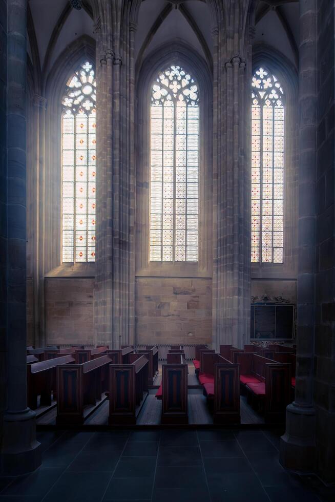 Meissen, Germany-august 17, 2022-Prayer benches between the columns of Meissen Cathedral on a sunny day photo