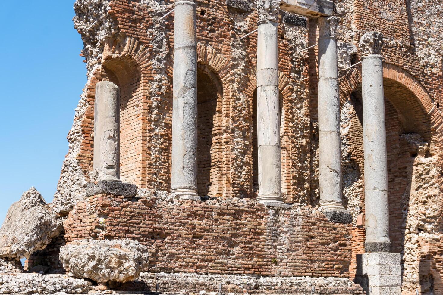Sicily, Italy-May 12, 2022-View of the ruins of the theatre of Taormina during a sunny day, photo