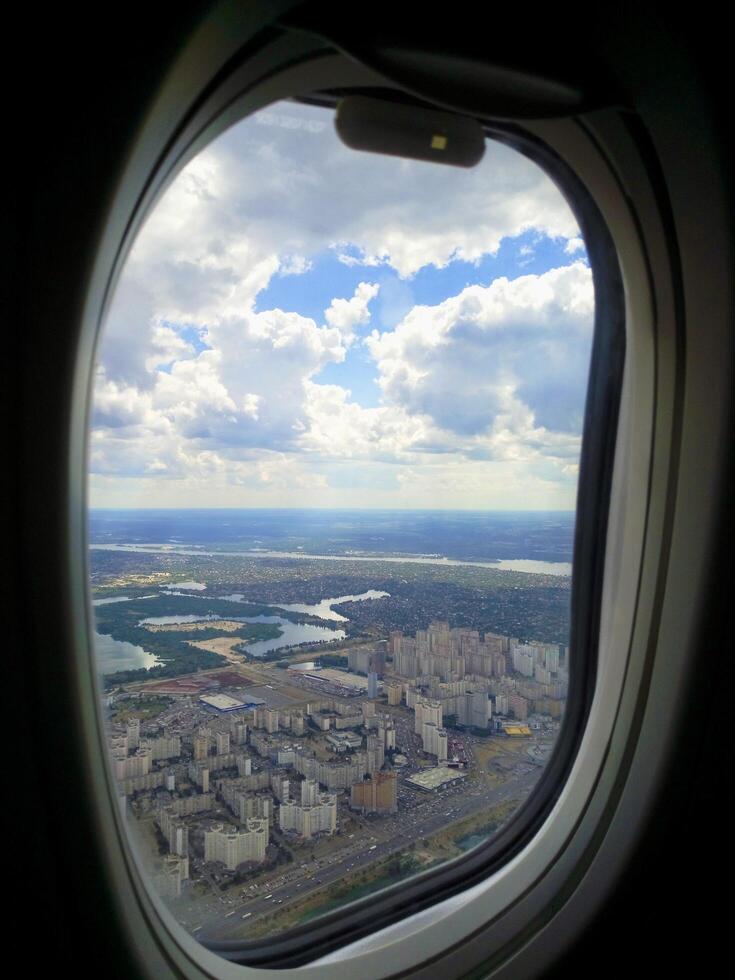 A view of a city from an airplane window photo
