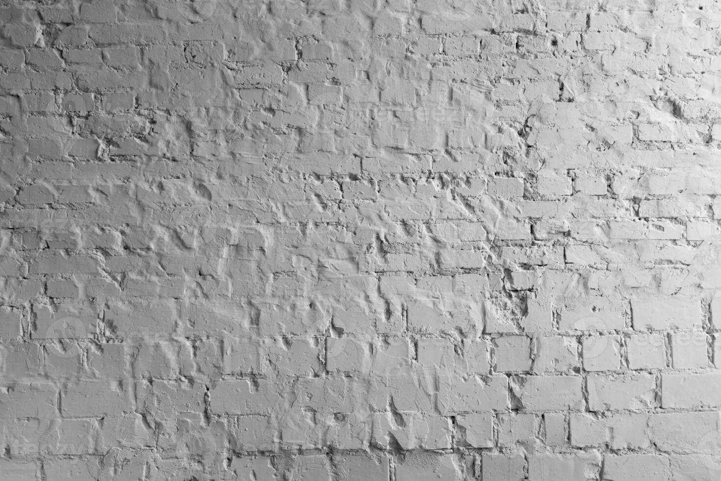 Textured white brick wall enhances minimalistic interior design in urban setting photo