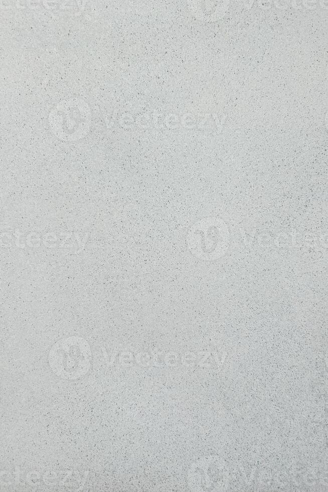 Smooth textured surface in light grey color ideal for various design applications photo