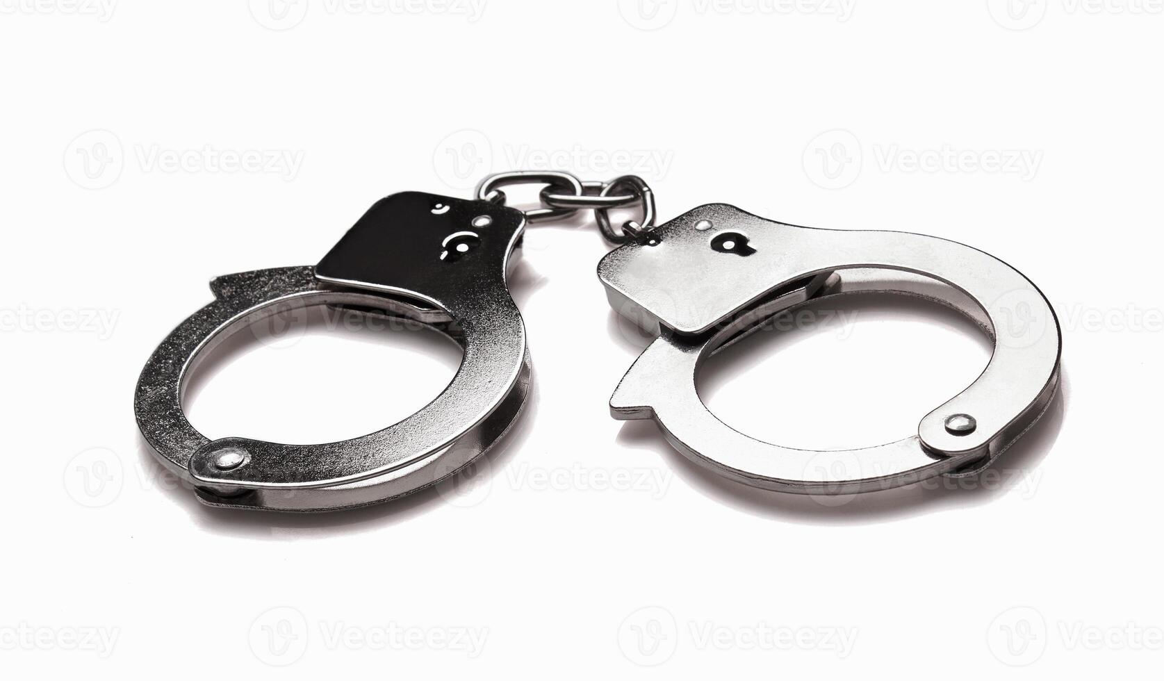Handcuffs isolated on a white photo