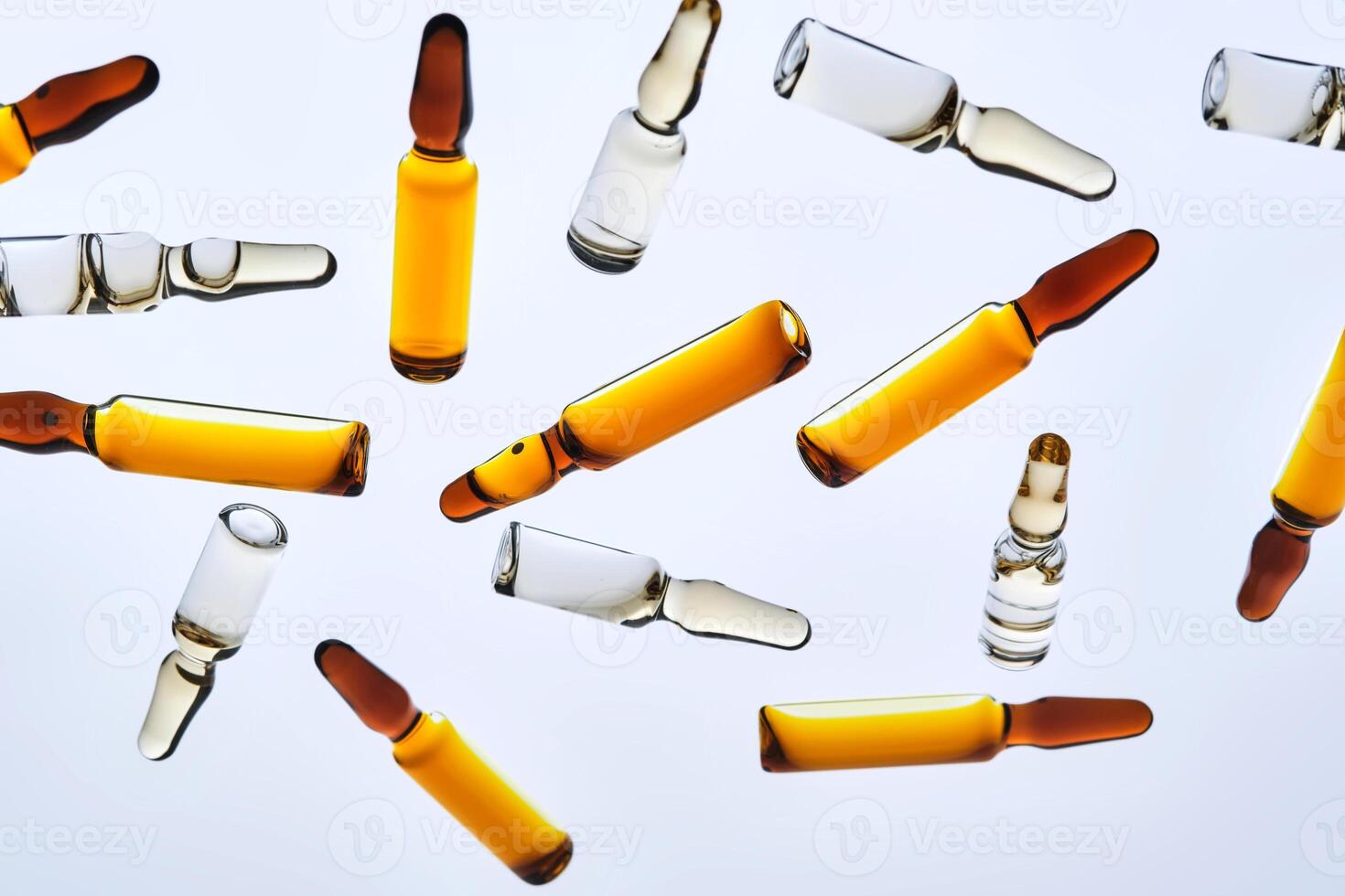 Various ampoules with drugs. View from below. photo