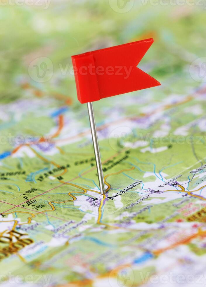 Push pin in a map photo