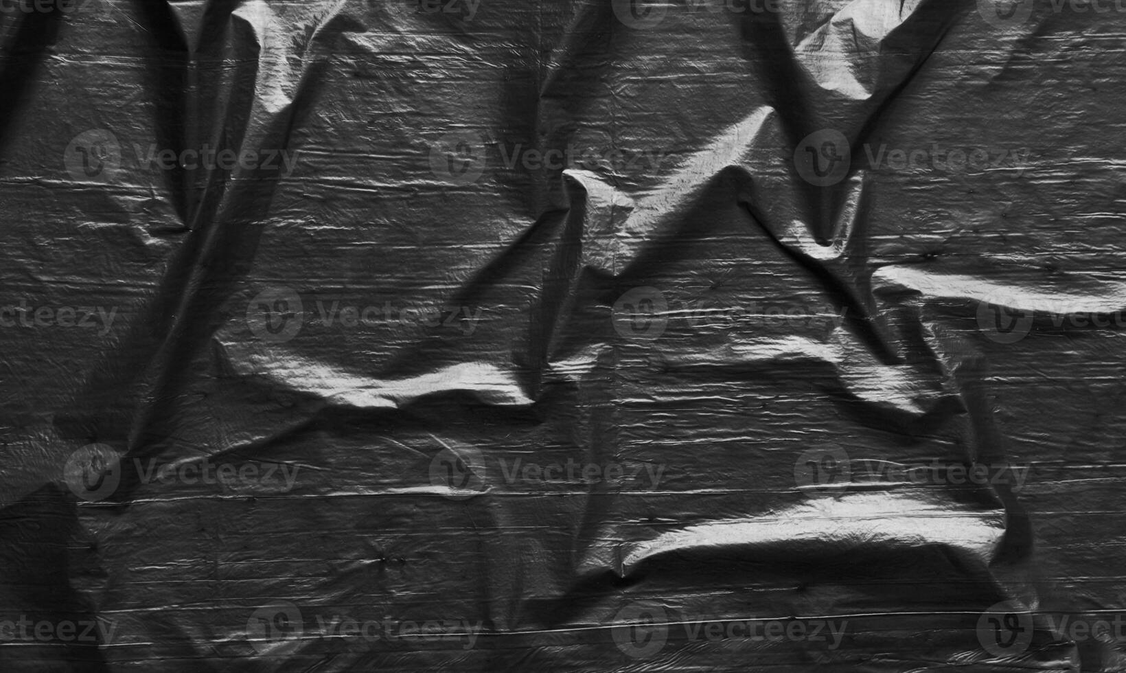 Black plastic wrap texture for background photo