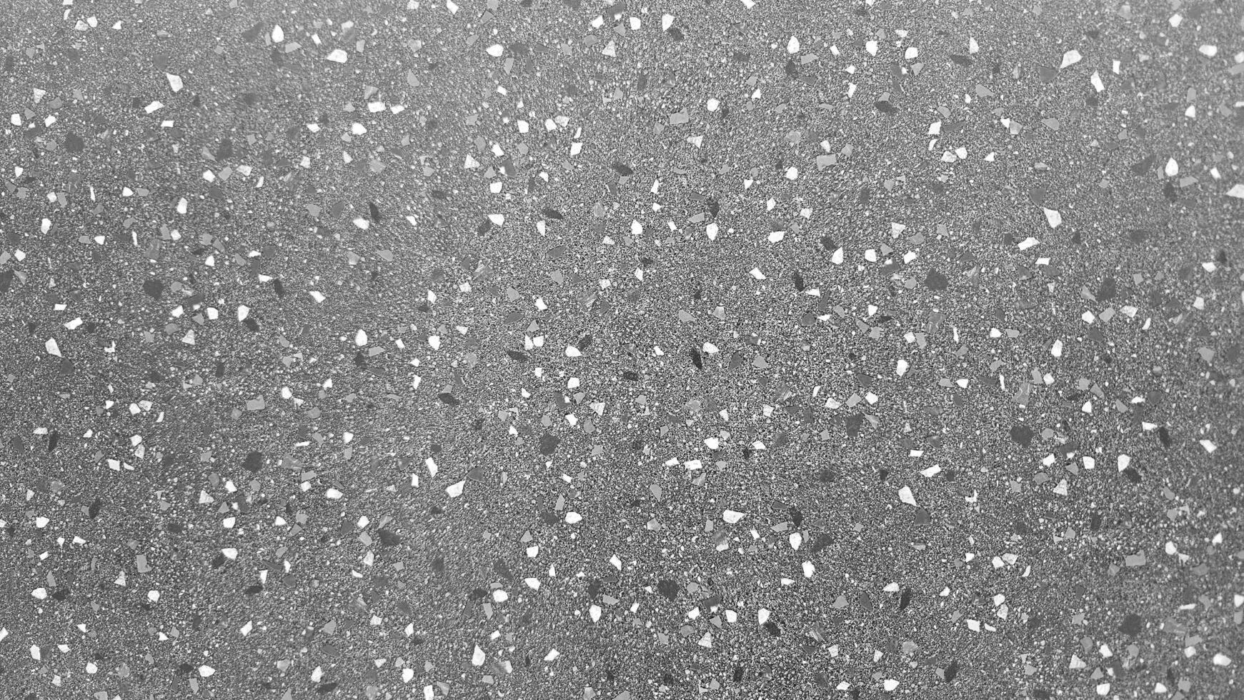 Textured and pattern of gray marble surface wall background in monochrome tone. Abstract wallpaper or floor and Detail of Granite stone. photo