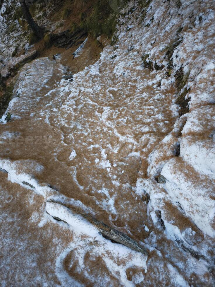Early winter scene in aosta, italy, showcasing snow dusted terrain and rugged landscape, capturing the transition from autumn to winter Lillaz photo